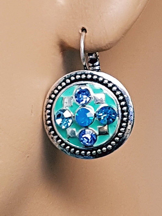 Ronde turquoise oorbellen met strass stenen