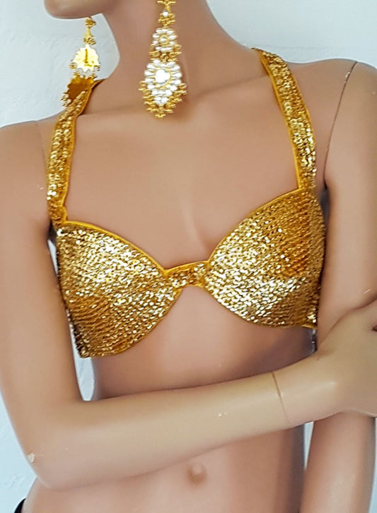 Leuke BH in compleet goud handbestikt met pailletjes.
