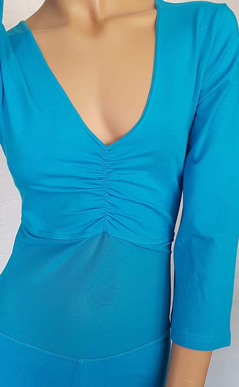 Catsuit turquoise met versterkt buiknet. Alleen maat nog in XS /S /3XL