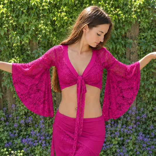 De top bestaat uit geheel kanten stretch stof in fuchsia