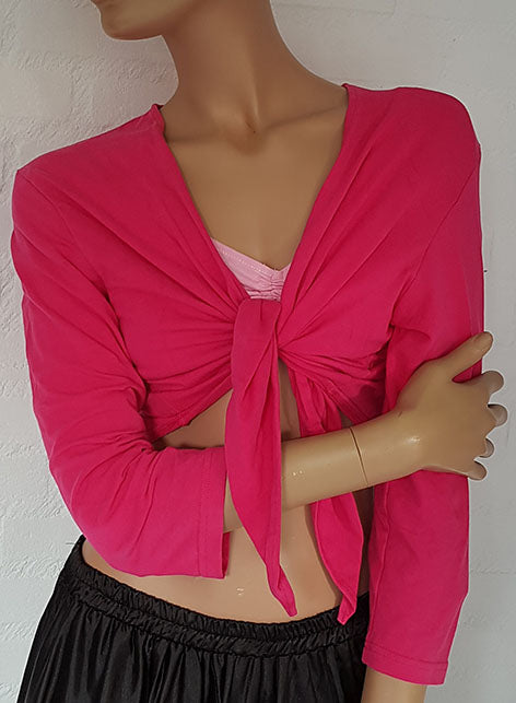 Buikdans top in fuchsia met driekwart mouw.