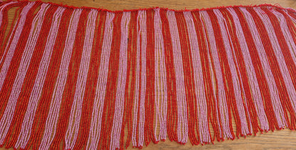 Kralensnoer met slierten rood roze 30cm