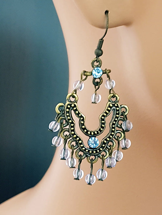 Goudkleurige oorbellen met strass steentjes