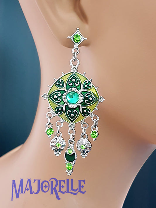 Zilverkleurige oorbellen met groene ster en strass steentjes