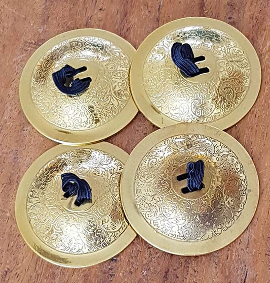 Mooie bewerkte koperen zils / cymbals / nwikssate

Set van 4 stuks, doorsnee 5cm.